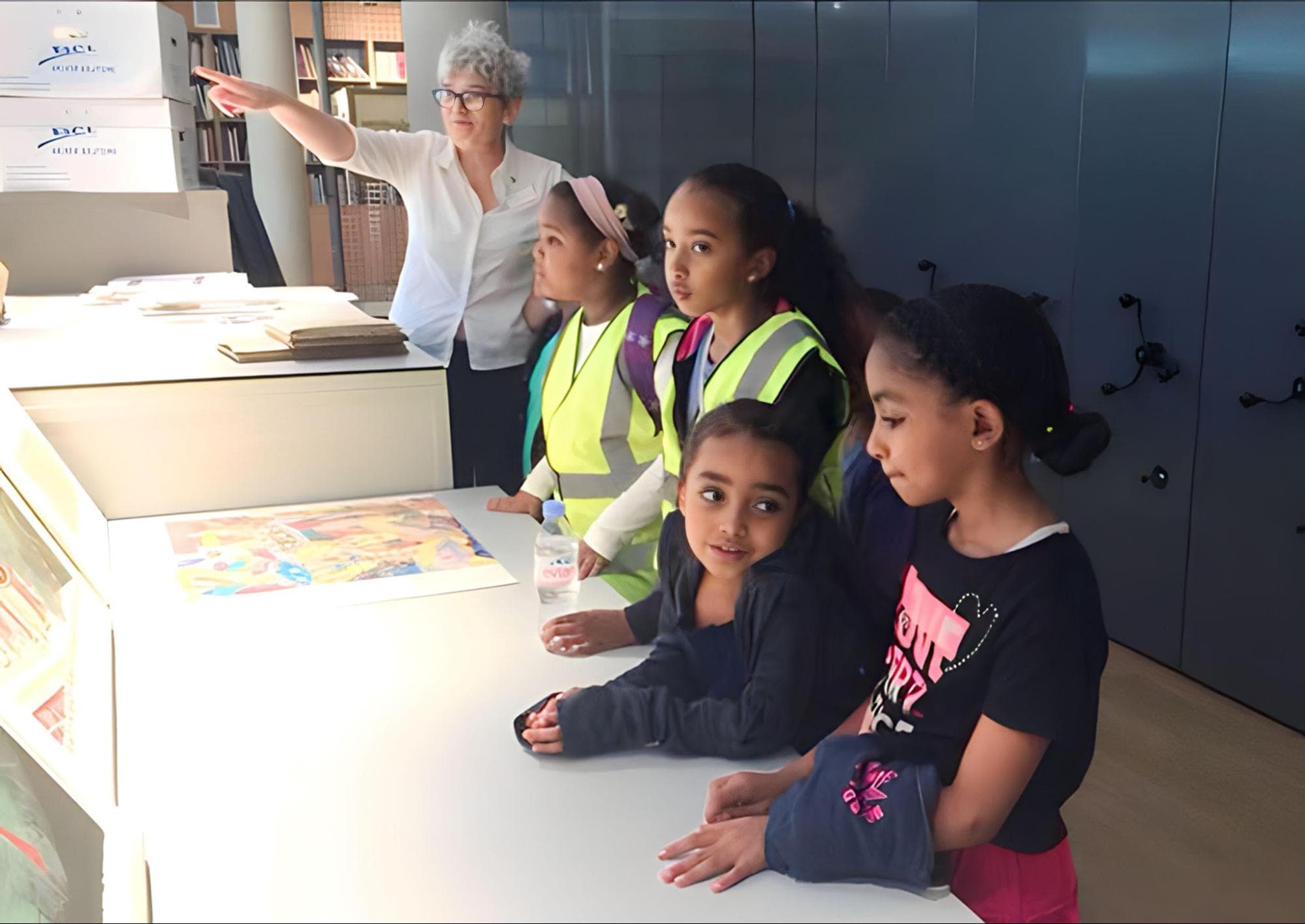 Children from the centre looking at a display on a cultural visit